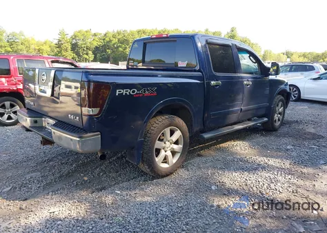 2010 Nissan Titan Le z USA, uszkodzony, nr VIN 1N6AA0EC0AN318044